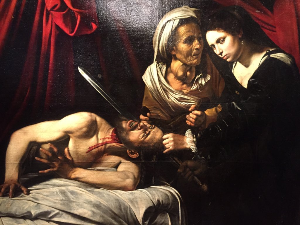 La-Giuditta-che-decapita-Oloferne-attribuita-a-Caravaggio-